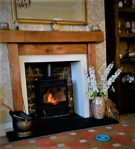 Rustic oak fire surrounds